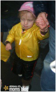 My daughter at age 3 running in the rain in the 2011 OKC kid's marathon. 