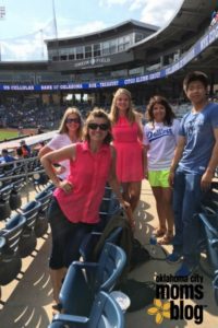 At a baseball game with students: Sarah from Norway, Hannah from Sweden, Valeria from Switzerland and Daichi from Japan
