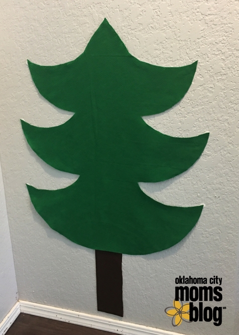 Attach the tree & stump to the wall using command strips.